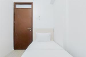 Comfort and Modern Look 2BR Loftvilles City Apartment By Travelio