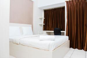 Strategic and Comfy Studio Apartment at Margonda Residence 5 By Travelio