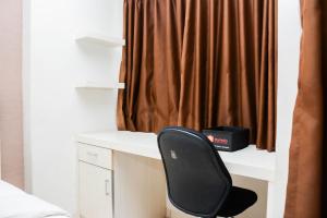 Strategic and Comfy Studio Apartment at Margonda Residence 5 By Travelio