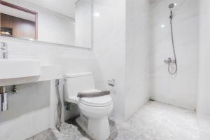 Tranquil and Comfort Living 1BR The Smith Alam Sutera Apartment By Travelio