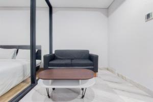 Tranquil and Comfort Living 1BR The Smith Alam Sutera Apartment By Travelio