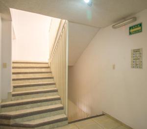 Suites Poliforum Inn