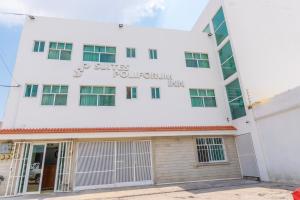 Suites Poliforum Inn