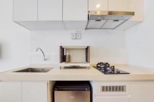 Best and Nice Studio at Sky House BSD Apartment near AEON Mall By Travelio