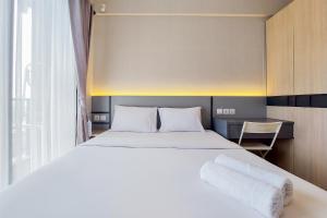 Gorgeous and Tidy Studio at Sky House BSD Apartment By Travelio