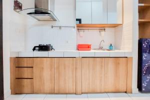 Warm and Homey Studio Room Casa de Parco Apartment By Travelio