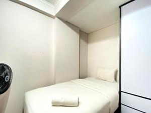 Nice 2BR at Gateway Pasteur Apartment By Travelio