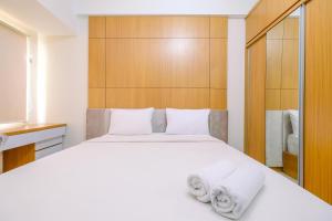 Simply Look Studio at Margonda Residence 5 Apartment By Travelio