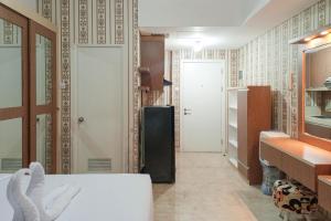 Minimalist and Comfort Studio Podomoro City Deli Medan Apartment By Travelio