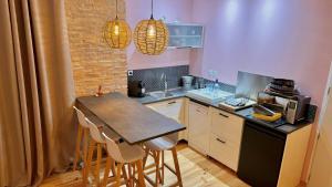 Appartements Le Crocolion : photos des chambres