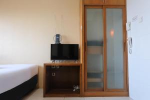 Homey Studio Apartment at Grand Setiabudi By Travelio