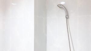 Minimalist and Homey Studio at Evenciio Margonda Apartment By Travelio