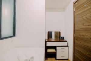 Modern Look 2BR at Sky House BSD Apartment By Travelio