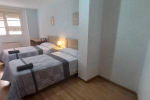 Apartamento con 3 dormitorios y plaza de garaje