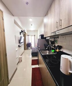 Cozy Two Bedroom Family Suites at Coast Residences near PICC, WTC & MOA