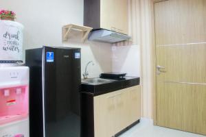 Minimalist Studio The Oasis Apartment near Omni Hospital Cikarang By Travelio
