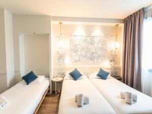 Hotels Brit Hotel Ker Lann Aeroport - Parc Expo : photos des chambres