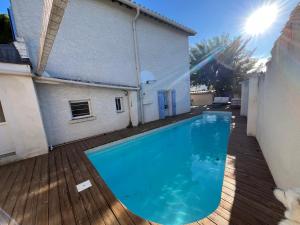 Appartements Villa Jardin piscine proche Centre-ville 10 mn des plages : photos des chambres