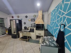 Praianos Casa com Piscina Praia Grande