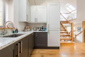 Woodside Lodge, surrounded by woodland and beautiful gardens