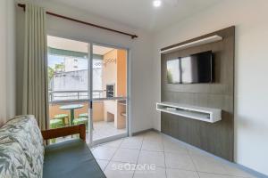 Apto c churrasqueira a 60m da praia SMB0307