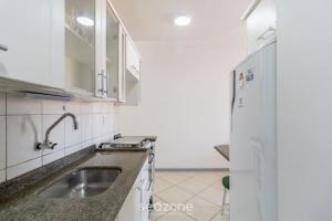 Apto c churrasqueira a 60m da praia SMB0307