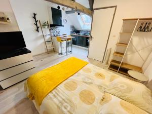 Appartements Au petit Marcade : photos des chambres