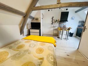 Appartements Au petit Marcade : photos des chambres