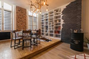 Appartements l-atypique au centre des arcades Elegant Spacieux : photos des chambres