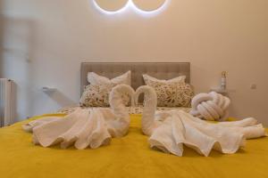 Appartements l-atypique au centre des arcades Elegant Spacieux : photos des chambres