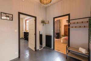 Appartements l-atypique au centre des arcades Elegant Spacieux : photos des chambres