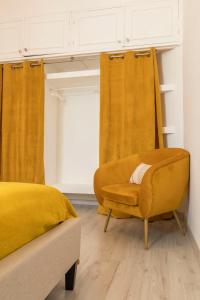 Appartements l-atypique au centre des arcades Elegant Spacieux : photos des chambres