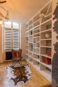 Appartements l-atypique au centre des arcades Elegant Spacieux : photos des chambres