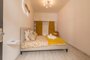 Appartements l-atypique au centre des arcades Elegant Spacieux : photos des chambres