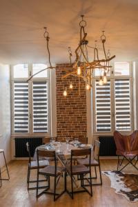 Appartements l-atypique au centre des arcades Elegant Spacieux : photos des chambres