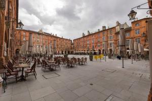 Appartements l-atypique au centre des arcades Elegant Spacieux : photos des chambres