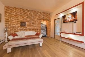 Appartements l-atypique au centre des arcades Elegant Spacieux : photos des chambres