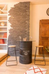 Appartements l-atypique au centre des arcades Elegant Spacieux : photos des chambres