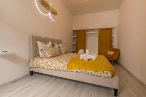 Appartements l-atypique au centre des arcades Elegant Spacieux : photos des chambres