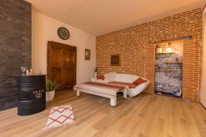 Appartements l-atypique au centre des arcades Elegant Spacieux : photos des chambres