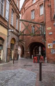 Appartements l-atypique au centre des arcades Elegant Spacieux : photos des chambres