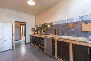 Appartements l-atypique au centre des arcades Elegant Spacieux : photos des chambres