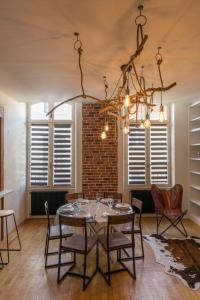 Appartements l-atypique au centre des arcades Elegant Spacieux : photos des chambres