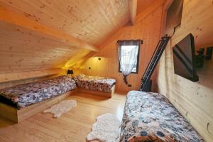 Maisons de vacances La Fleche 2 - Chalet Standing - Jacuzzi Privatif : photos des chambres