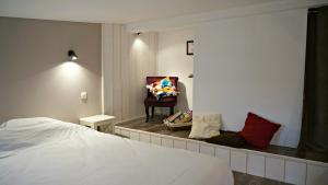 Appartements Little Suite - Nathan : photos des chambres