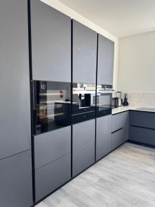 Loft épuré avec parking privé.