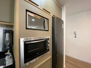 Ar Condicionado com garagem coberta a 800m do mar