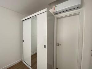 Ar Condicionado com garagem coberta a 800m do mar