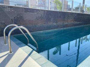 Ar Condicionado com garagem coberta a 800m do mar