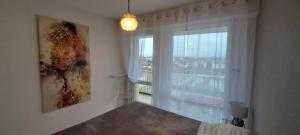 Appartements Vue magnifique, 7 mn gare, Muse, Centre, parking : photos des chambres
